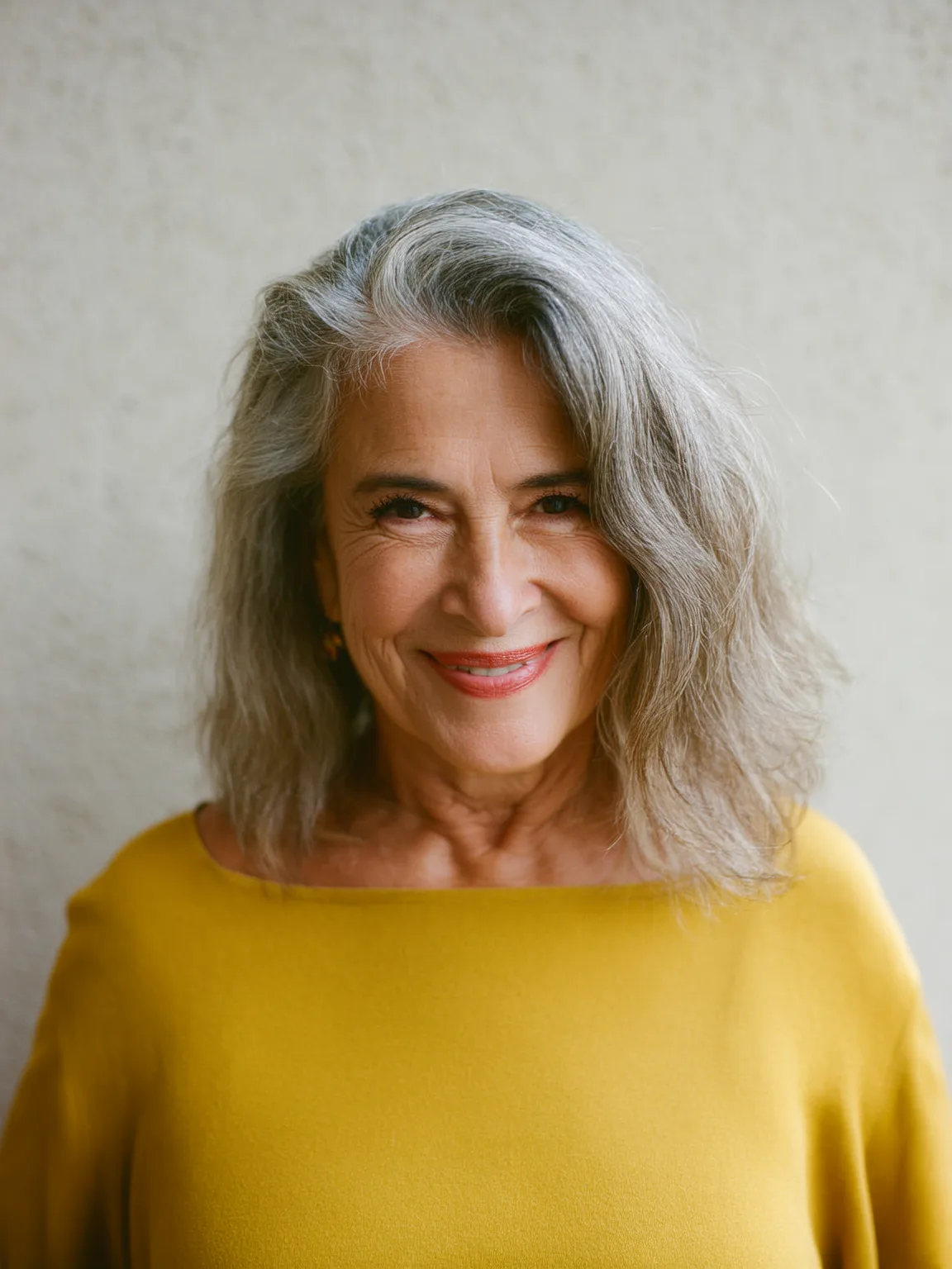 Shoulder-Length Silver Grey Wavy Layers with Highlights